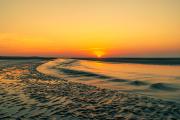 Tide Flowing At Sunrise